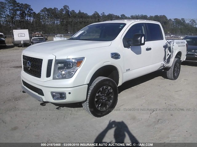 1N6BA1F41GN516674 - 2016 NISSAN TITAN XD SL/PRO-4X/PLAT RESERVE WHITE photo 2