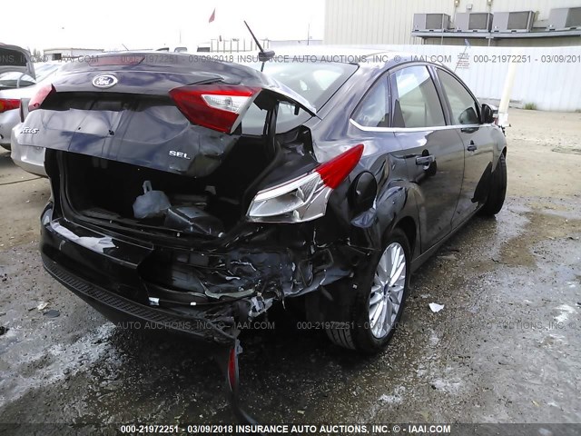 1FAHP3H24CL161854 - 2012 FORD FOCUS SEL BLACK photo 4