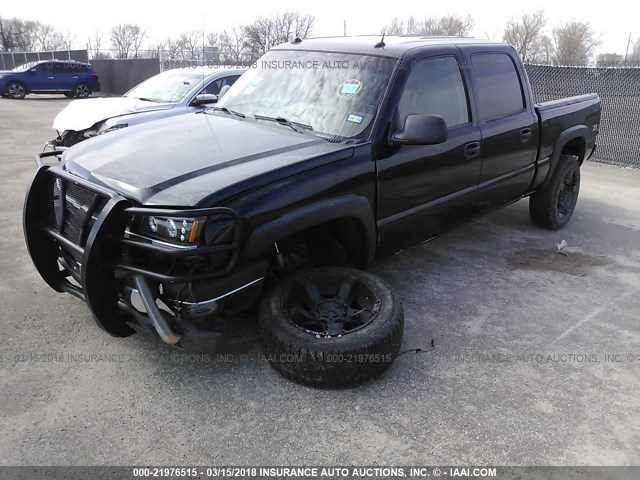 2GCEK13T941349552 - 2004 CHEVROLET SILVERADO K1500 BLACK photo 2