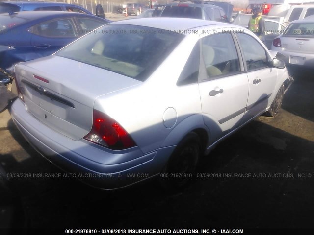 1FAFP33P51W313145 - 2001 FORD FOCUS LX SILVER photo 4