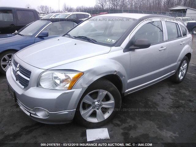 1B3CB3HA5BD296474 - 2011 DODGE CALIBER MAINSTREET SILVER photo 2