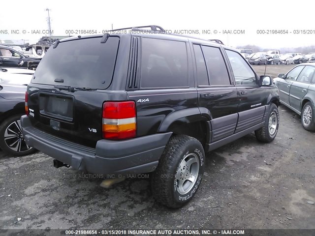 1J4GZ58Y8WC219737 - 1998 JEEP GRAND CHEROKEE LAREDO/TSI BLACK photo 4