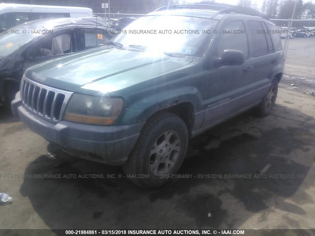 1J4GW58S3XC535830 - 1999 JEEP GRAND CHEROKEE LAREDO GREEN photo 2