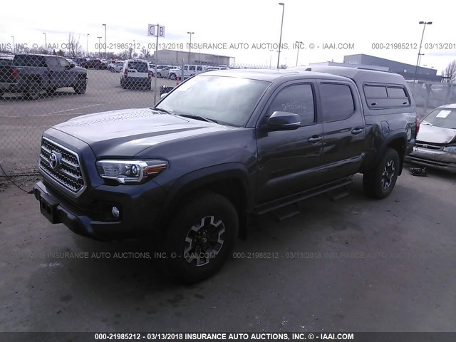 3TMDZ5BN7HM024057 - 2017 TOYOTA TACOMA DBL CAB/SR5/TRD SPORT/OR BLACK photo 2