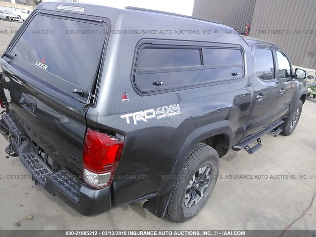 3TMDZ5BN7HM024057 - 2017 TOYOTA TACOMA DBL CAB/SR5/TRD SPORT/OR BLACK photo 4