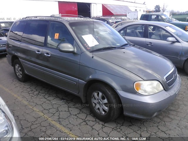 KNDUP131046586127 - 2004 KIA SEDONA EX/LX GRAY photo 1