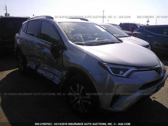 JTMZFREV2JJ159421 - 2018 TOYOTA RAV4 LE SILVER photo 1