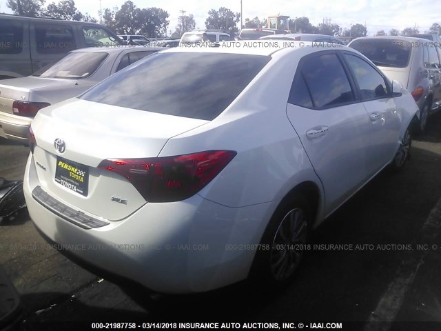 5YFBURHE8HP674013 - 2017 TOYOTA COROLLA L/LE/XLE/SE/XSE WHITE photo 4