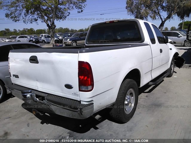 1FTZX1728YNA82865 - 2000 FORD F150 WHITE photo 4