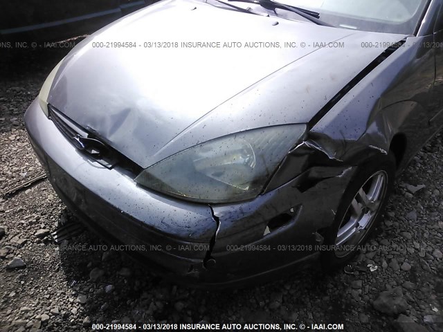 1FAFP38Z84W154829 - 2004 FORD FOCUS ZTS GRAY photo 6