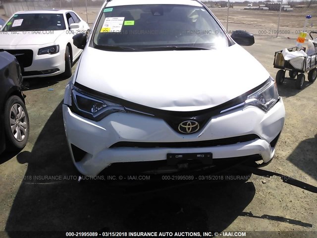 JTMBFREV5HD202157 - 2017 TOYOTA RAV4 LE WHITE photo 6