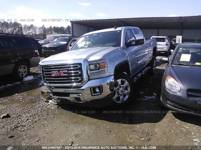 1GT12TEG3HF155561 - 2017 GMC SIERRA K2500 SLT SILVER photo 2