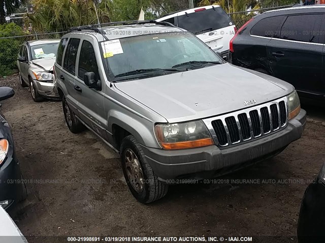 1J4G248SXYC274784 - 2000 JEEP GRAND CHEROKEE LAREDO SILVER photo 1