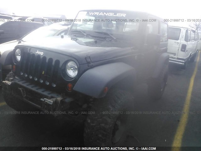1C4AJWAG3CL222907 - 2012 JEEP WRANGLER SPORT შავი ფოტო 2