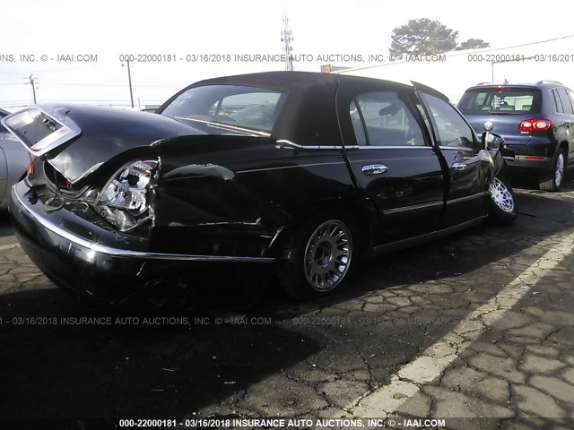 1LNHM81W7YY843906 - 2000 LINCOLN TOWN CAR EXECUTIVE BLACK photo 4