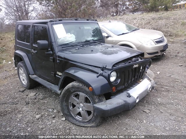 1J4FA54139L717506 - 2009 JEEP WRANGLER SAHARA BLACK photo 1