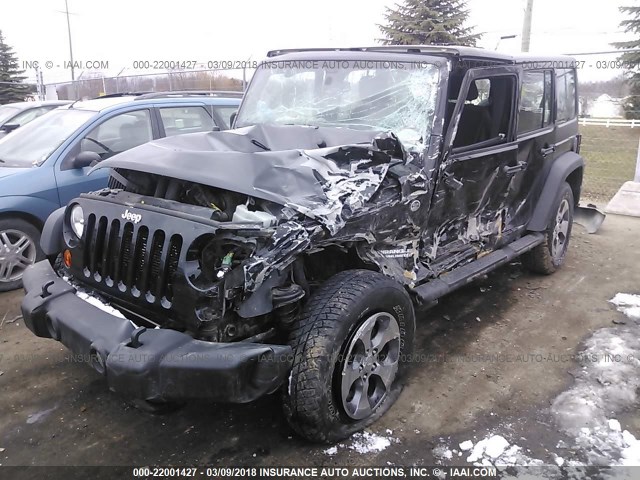 1C4BJWDG0DL632632 - 2013 JEEP WRANGLER UNLIMITE SPORT BLACK photo 2