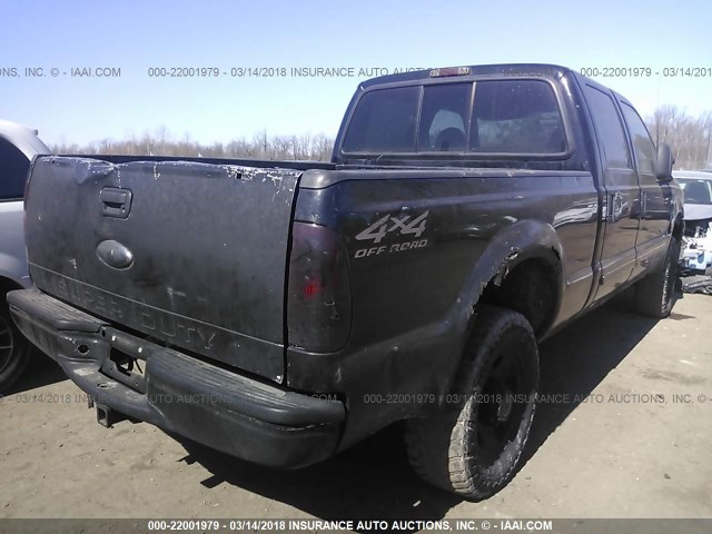 1FTSW31F71EB05179 - 2001 FORD F350 SRW SUPER DUTY BLACK photo 4