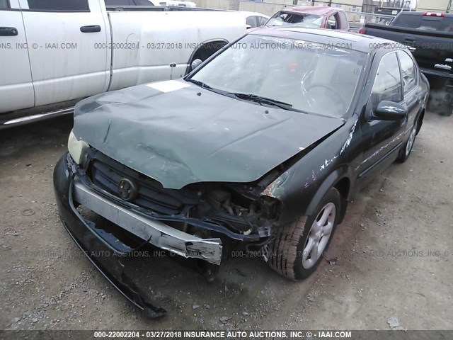 JN1CA31A7YT211311 - 2000 NISSAN MAXIMA GLE/GXE/SE GREEN photo 2