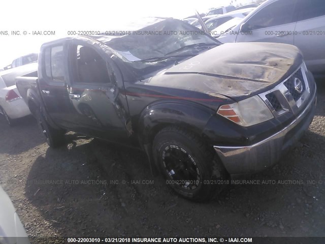 1N6AD07U79C426469 - 2009 NISSAN FRONTIER CREW CAB SE/LE/NISMO BLACK photo 1