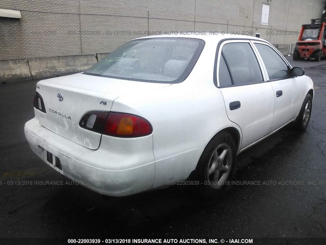 1NXBR12E4YZ345965 - 2000 TOYOTA COROLLA VE/CE/LE WHITE photo 4