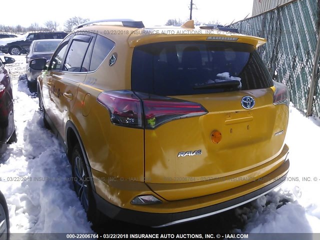 JTMRJREV0HD061219 - 2017 TOYOTA RAV4 HV LE/XLE YELLOW photo 3