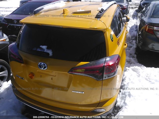 JTMRJREV0HD061219 - 2017 TOYOTA RAV4 HV LE/XLE YELLOW photo 4