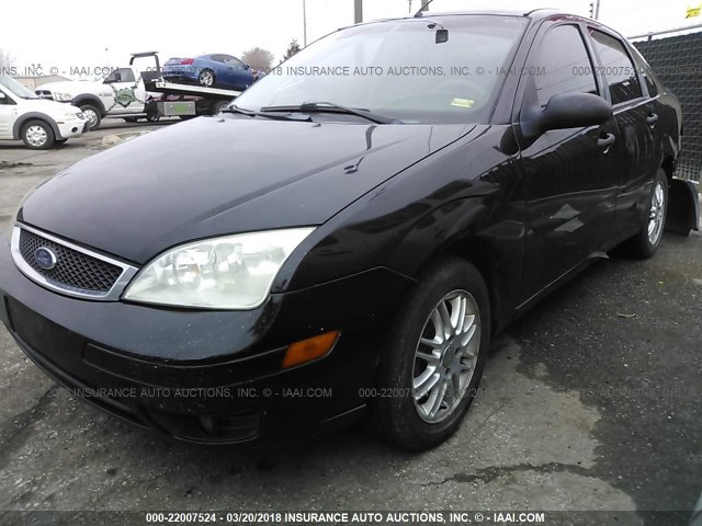 1FAHP34N07W204946 - 2007 FORD FOCUS ZX4/S/SE/SES BLACK photo 2