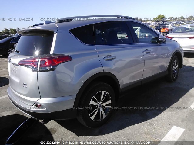 2T3RFREVXJW712561 - 2018 TOYOTA RAV4 ADVENTURE/XLE SILVER photo 4