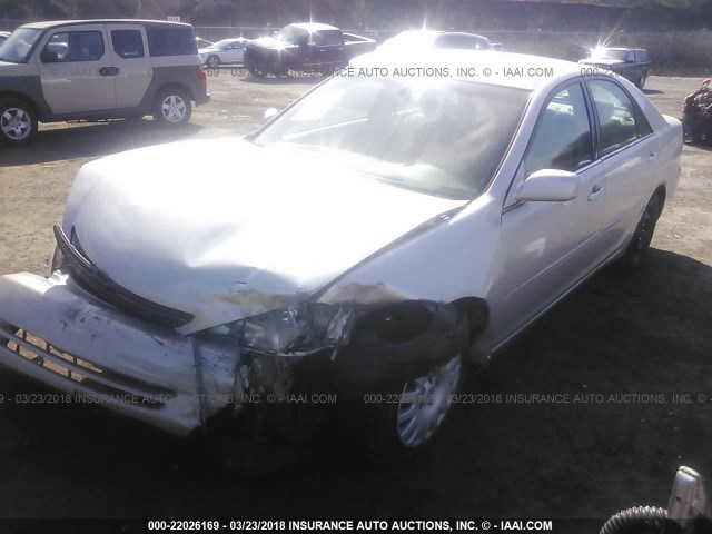4T1BE32K34U869387 - 2004 TOYOTA CAMRY LE/XLE/SE ბეჟი ფოტო 2