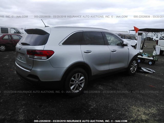 5XYPG4A36GG156462 - 2016 KIA SORENTO LX/L SILVER photo 4