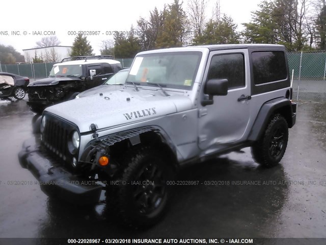 1C4AJWAG9GL145692 - 2016 JEEP WRANGLER SPORT SILVER photo 2