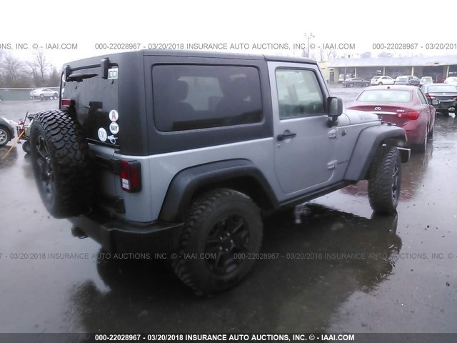 1C4AJWAG9GL145692 - 2016 JEEP WRANGLER SPORT 银色 照片 4