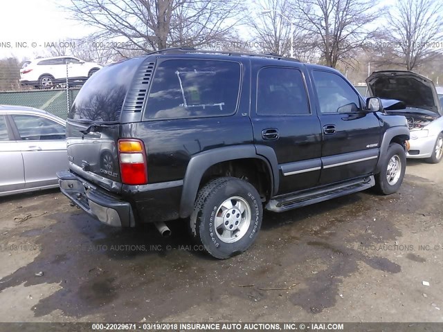 1GNEK13ZX3J207095 - 2003 CHEVROLET TAHOE K1500 BLACK photo 4