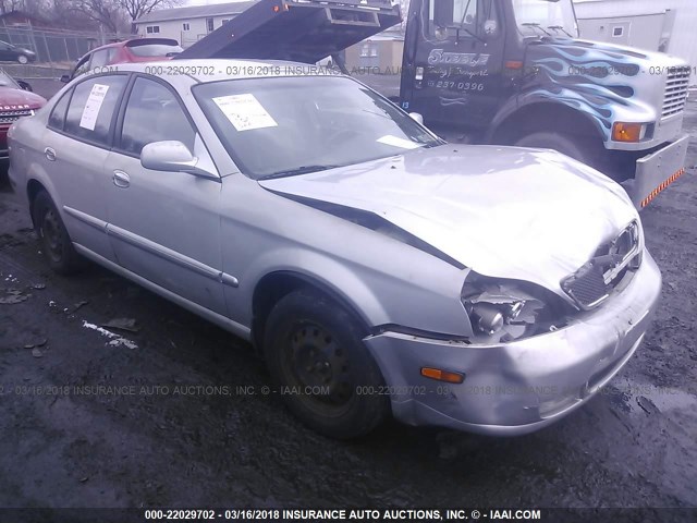 KL5VJ52L84B112939 - 2004 SUZUKI VERONA S/LX SILVER photo 1