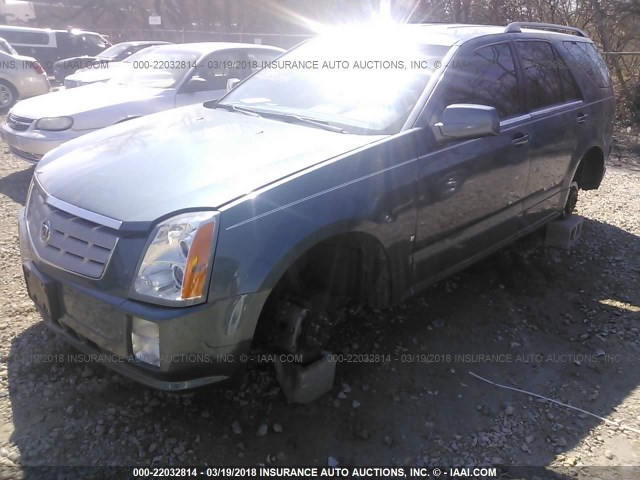 1GYEE637560214939 - 2006 CADILLAC SRX BLUE photo 6