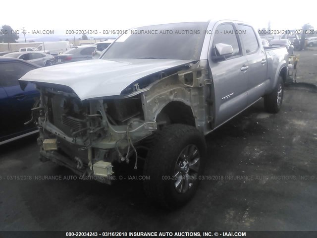 3TMDZ5BN4GM009787 - 2016 TOYOTA TACOMA DBL CAB/SR5/TRD SPORT/OR SILVER photo 2