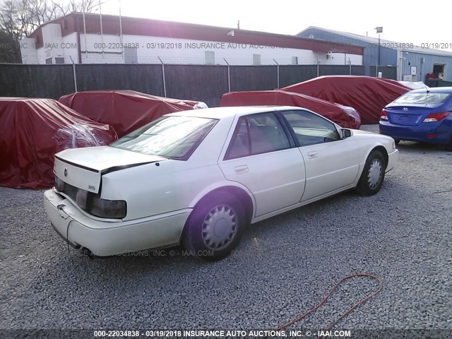 1G6KY5296RU829979 - 1994 CADILLAC SEVILLE STS WHITE photo 4
