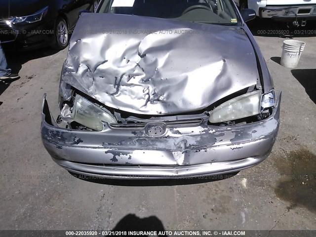 1Y1SK5280YZ422095 - 2000 CHEVROLET GEO PRIZM LSI TAN photo 6