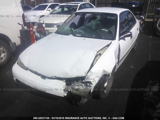 1Y1SK52811Z439171 - 2001 CHEVROLET GEO PRIZM LSI WHITE photo 6