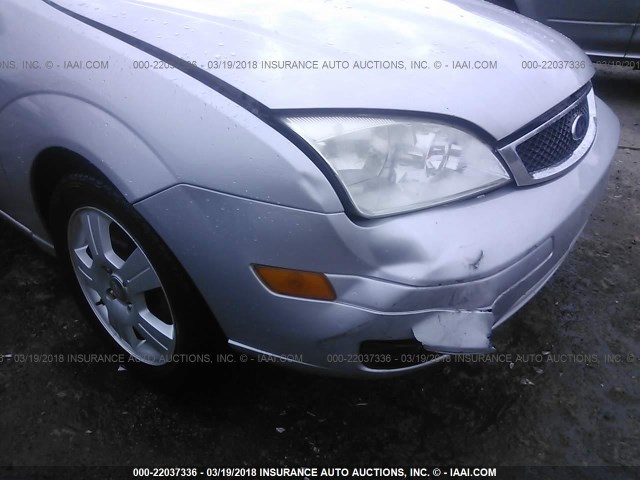 1FAHP37N76W229594 - 2006 FORD FOCUS ZX5 SILVER photo 6