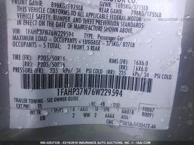 1FAHP37N76W229594 - 2006 FORD FOCUS ZX5 SILVER photo 9