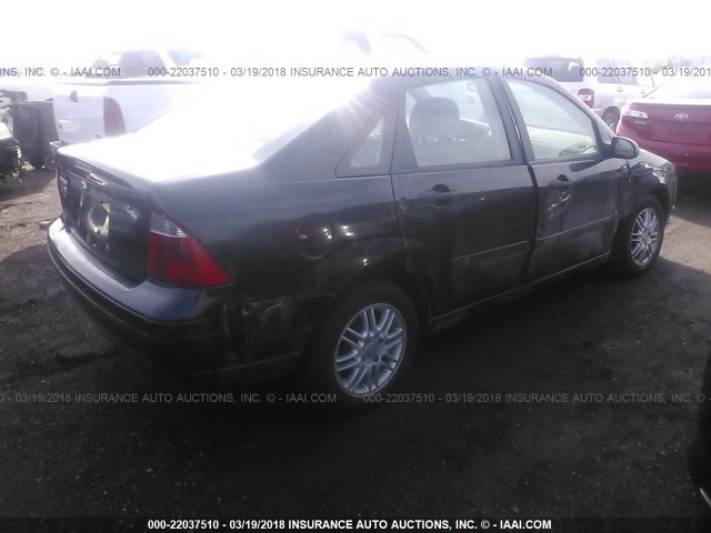 1FAFP34N97W206864 - 2007 FORD FOCUS ZX4/S/SE/SES BLACK photo 4