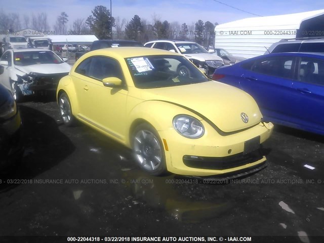 3VWJP7AT7CM625592 - 2012 VOLKSWAGEN BEETLE YELLOW photo 1