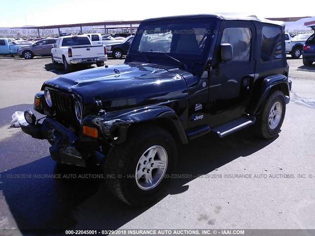 1J4FA59S54P747366 - 2004 JEEP WRANGLER / TJ SAHARA BLACK photo 2