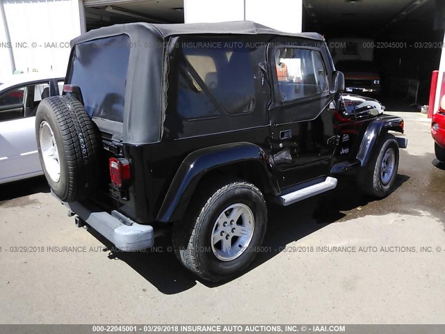 1J4FA59S54P747366 - 2004 JEEP WRANGLER / TJ SAHARA BLACK photo 4