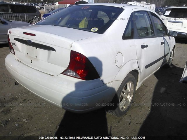 1FAFP33P73W102094 - 2003 FORD FOCUS LX WHITE photo 4