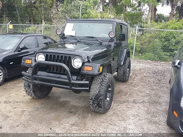 1J4FA59S4YP778131 - 2000 JEEP WRANGLER / TJ SAHARA BLACK photo 2