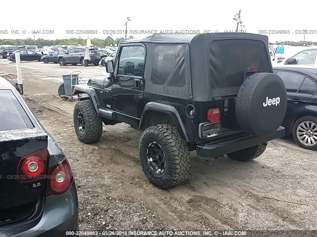 1J4FA59S4YP778131 - 2000 JEEP WRANGLER / TJ SAHARA BLACK photo 3