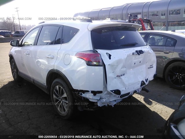 JTMRJREVXHD134032 - 2017 TOYOTA RAV4 HV LE/XLE WHITE photo 3